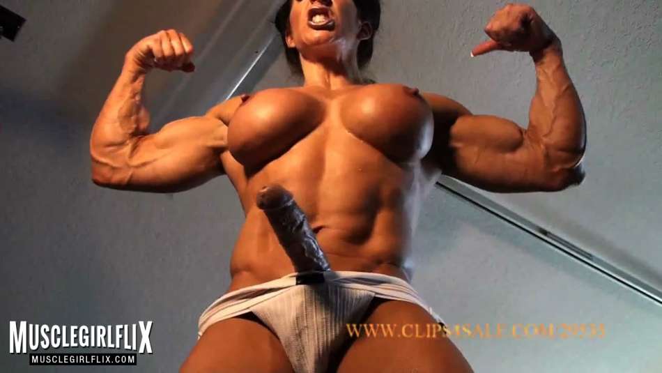 "Female bodybuilder Angela Salvagno is packing a serious cock bulge in...