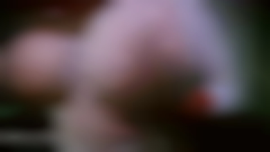 close up shot of amazing big boos squeezing wet top