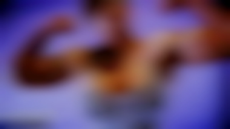 Goddess Rapture flexing her huge biceps