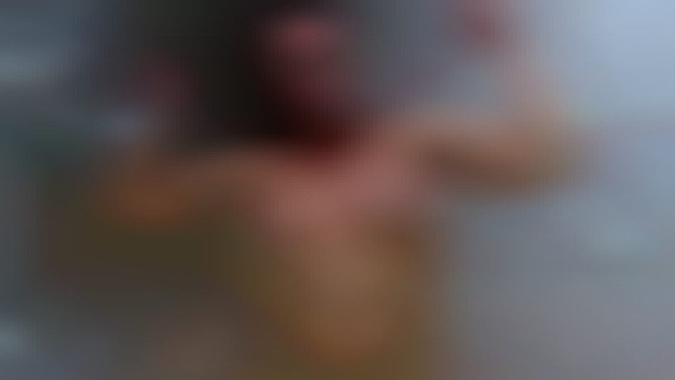 Brandi Mae topless hardbody flexing biceps