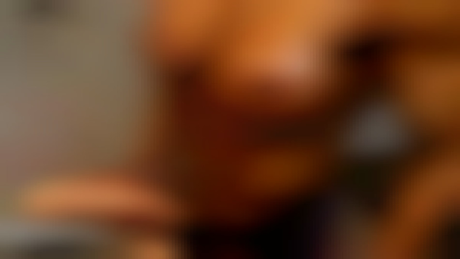 Female Bodybuilder Angela Salvagno holding her huge futanari cock