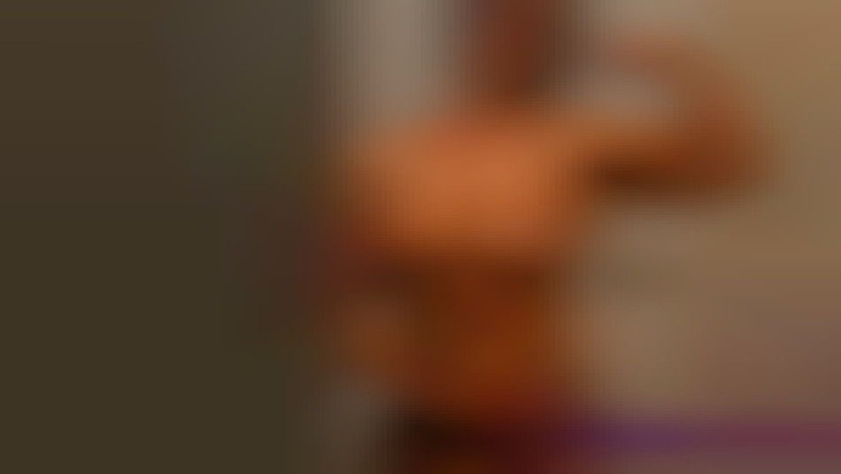 Female Bodybuilder Angela Salvagno holding her huge futanari cock