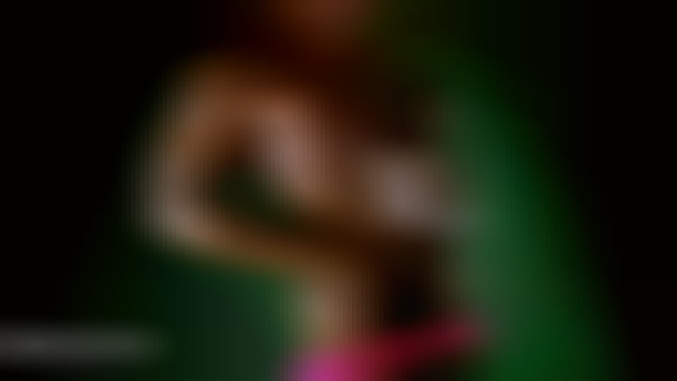 Kathy Connors oiled up round tits